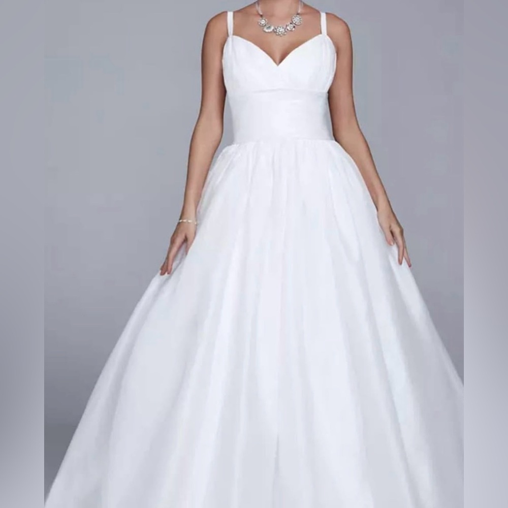 Wedding gown from David’s bridal new with tags. Size 10